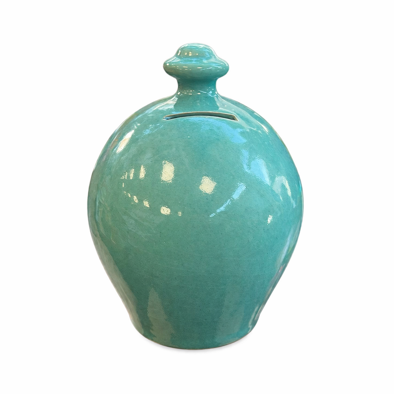 Salvadanaio in ceramica smaltata verde turchese – stile artigianale elegante. Altezza 20 cm
